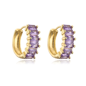Close-up of 18K gold plated huggie earrings featuring baguette-cut purple zircon stones