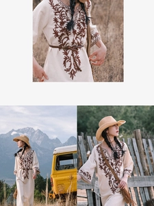 Detail of bohemian ivory maxi dress with brown floral embroidery and woven belt accessory