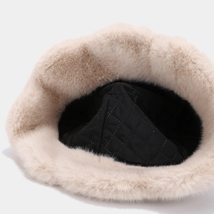 Winter faux fur bucket hat with warm quilted lining and soft cream plush texture
