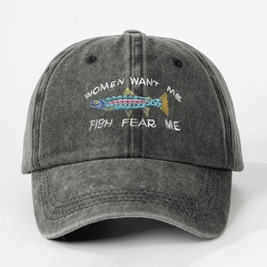 Detailed embroidery of WOMEN WANT ME FISH FEAR ME text on washed grey cotton baseball cap