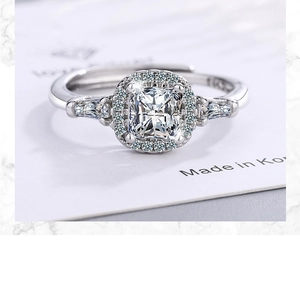Silver halo ring with square-cut cubic zirconia on a Made in Korea card detail