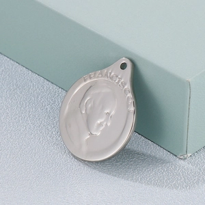 Oval stainless steel pendant featuring a detailed profile portrait of Pope Francis