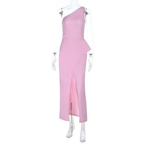 Detail of pink one-shoulder dress featuring ruffled waist and high slit design