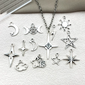 Silver alloy celestial charms featuring moon, star, and sun symbols for DIY jewelry making