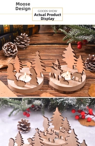 Détail du bougeoir de Noël en bois avec découpes de renne et d'arbre de Noël