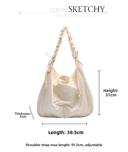 Detailed size chart of cream canvas tote bag showing dimensions and adjustable straps
