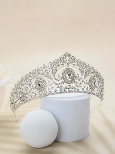 Detail of silver alloy bridal crown featuring sparkling rhinestones and elegant crystal inlay