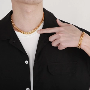 Polished gold Cuban link chain set with necklace and bracelet for men in hip-hop style
