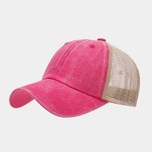Detail view of pink washed cotton baseball cap with khaki breathable mesh back