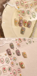 Detailed retro floral nail stickers with gold outlines and vintage rose patterns