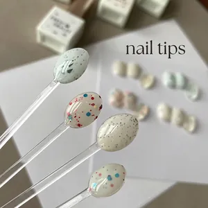 Four-color candy bubble nail gel polish set with glitter flakes on clear display sticks
