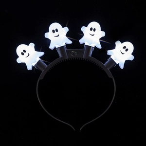 Detail of four glowing white ghosts on a black headband for Halloween party atmosphere