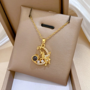 Golden titanium steel unicorn crescent moon necklace with crystal paving and projection stone