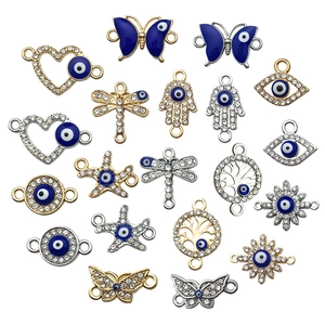 Mix of 20 Evil Eye charms and connectors with butterfly, heart and hamsa designs