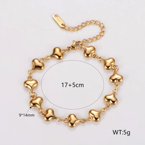 Detailed view of gold heart link bracelet with 17+5cm dimensions and steel hallmark