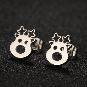 Macro shot of silver reindeer-shaped stainless steel stud earrings with hollow design