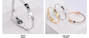 Detailed close-up of buckle-style titanium steel bangles with sparkling crystals