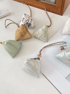 Traditional Zongzi-shaped handmade fabric charms with colorful woven cords for bags