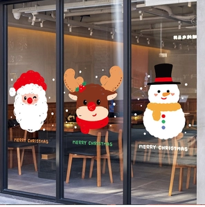 Detail of Christmas window stickers with Santa, Reindeer, and Snowman designs