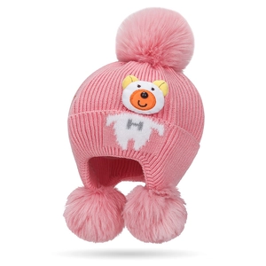 Pink knit baby earflap hat with three plush pom-poms and cute cartoon bear patch