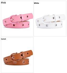 Detail of pink, white and camel skinny belts with large round eyelets and matching buckles