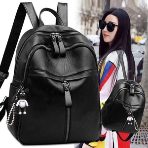 Large capacity black PU leather backpack with multi-zipper pockets and bear pendant