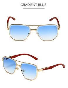 Detail view of gold metal double bridge frames and gradient blue lenses on wooden eyewear