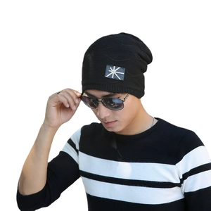 Men's black knitted beanie with square logo patch and warm fleece lining for outdoors