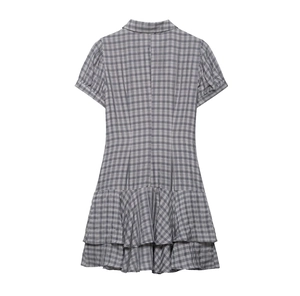 Back view of gray plaid dress featuring short sleeves and multi-layer ruffle hem