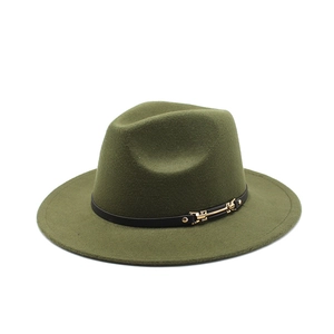 Detail of olive green wool fedora hat featuring a black leather band and gold metal buckle