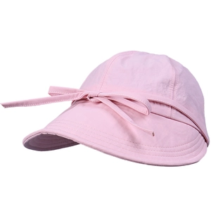 Pink sun hat for women featuring a sweet ribbon bow and lightweight nylon fabric