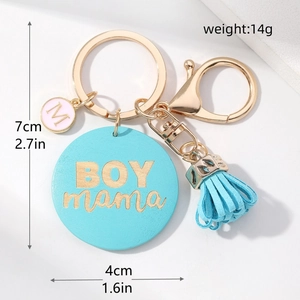 Detail view of BOY mama keychain with blue tassel and dimensions including 14g weight