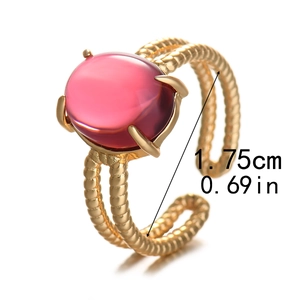 French style gold ring with pink oval stone and twisted band design with size guide
