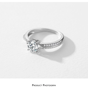 Macro shot of 925 sterling silver ring featuring a six-prong round zircon setting