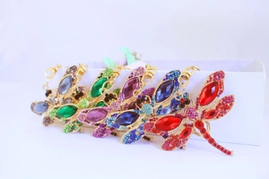 Set of five colorful rhinestone dragonfly keychains in various vibrant crystal colors