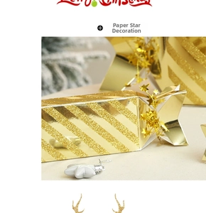 Close-up of golden glitter paper star decoration with festive Merry Christmas message