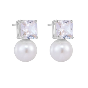 Detailed view of silver stud earrings featuring square-cut zircon and white pearls