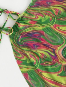Macro view of colorful marble print mesh fabric with drawstring and tie-side details