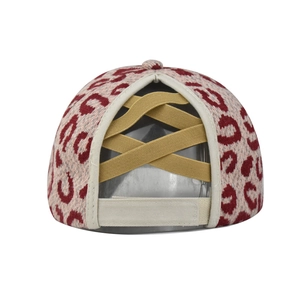 Detail of leopard print knit baseball cap with elastic criss-cross high ponytail opening
