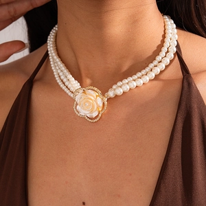Elegant multi-layer pearl necklace featuring a vintage rose floral pendant for women