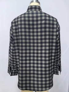 Back view of classic green and grey plaid long sleeve shirt with a pointed collar detail