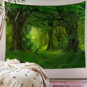 Detailed view of forest landscape wall tapestry hanging as a headboard in a cozy bedroom