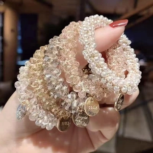 Elegant beaded crystal hair ring set with pearl and metal charms for women