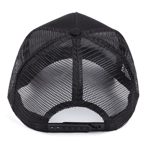 Detail of black trucker hat showing breathable mesh back and adjustable snap closure