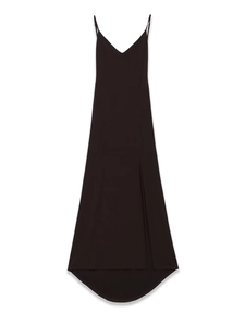 Detail view of black crepe maxi dress with V-neckline and high side slit on white background