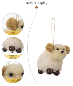 Detail display of a plush sheep ornament showing wooden beads and curly wool texture