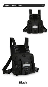 Detail view of black tactical vest chest bag with silver reflective strips and nylon pockets