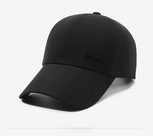 Detail shot of the side profile of a black baseball cap with NYS letter embroidery