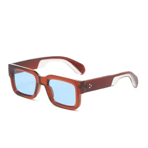 Retro square thick frame sunglasses with brown translucent finish and blue tinted lenses