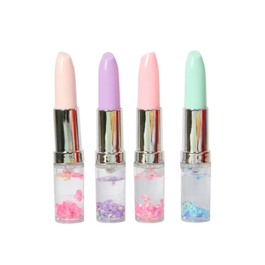 Lipstick-shaped liquid glitter pens in pastel colors with flowing stars and hearts